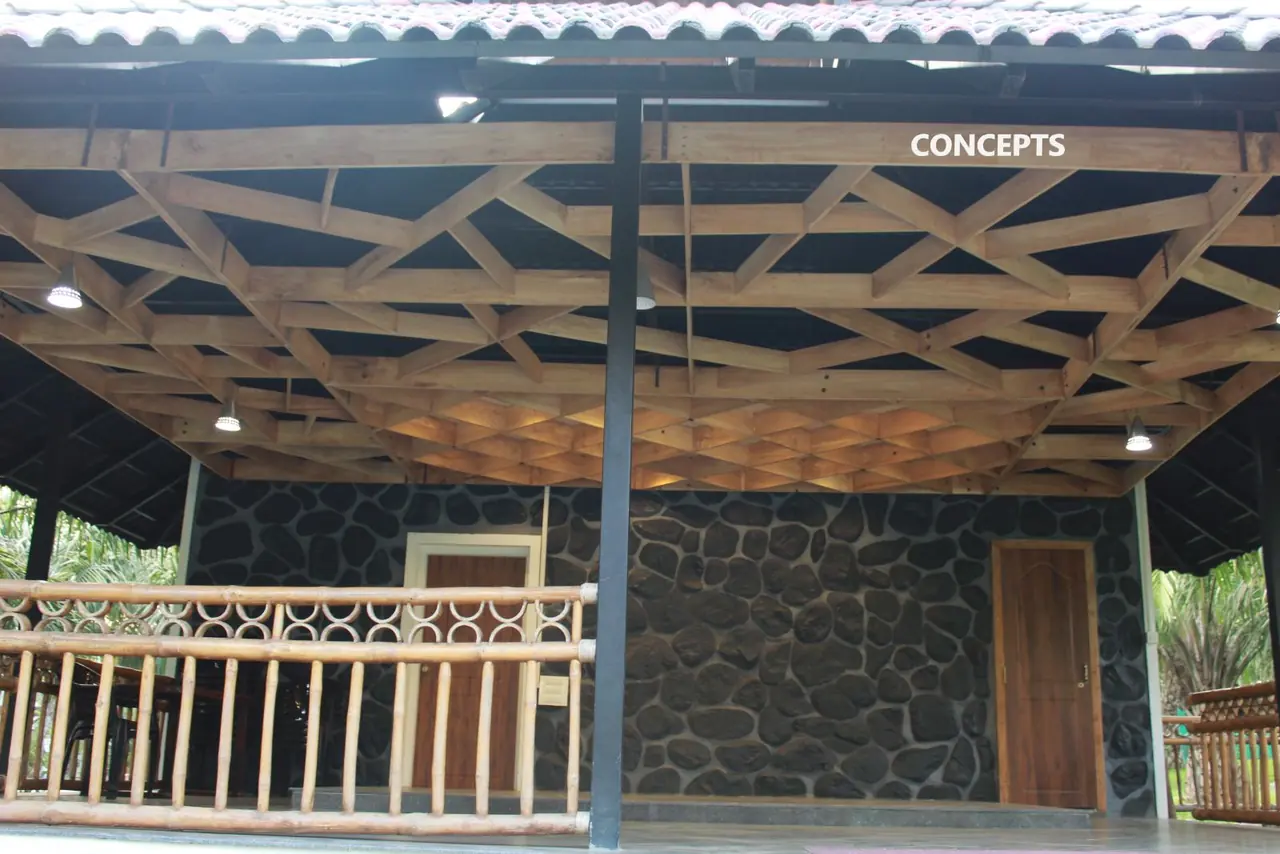 Timber lattice roof structure under construction supervision at Palm Era Resorts
